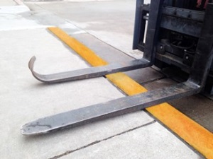 Worn forklift forks